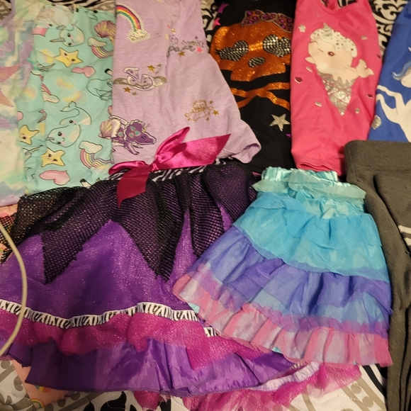 3 dresses, 4 tanks, 2 shirts, 2 tutus and tights. - Picture 9 of 10